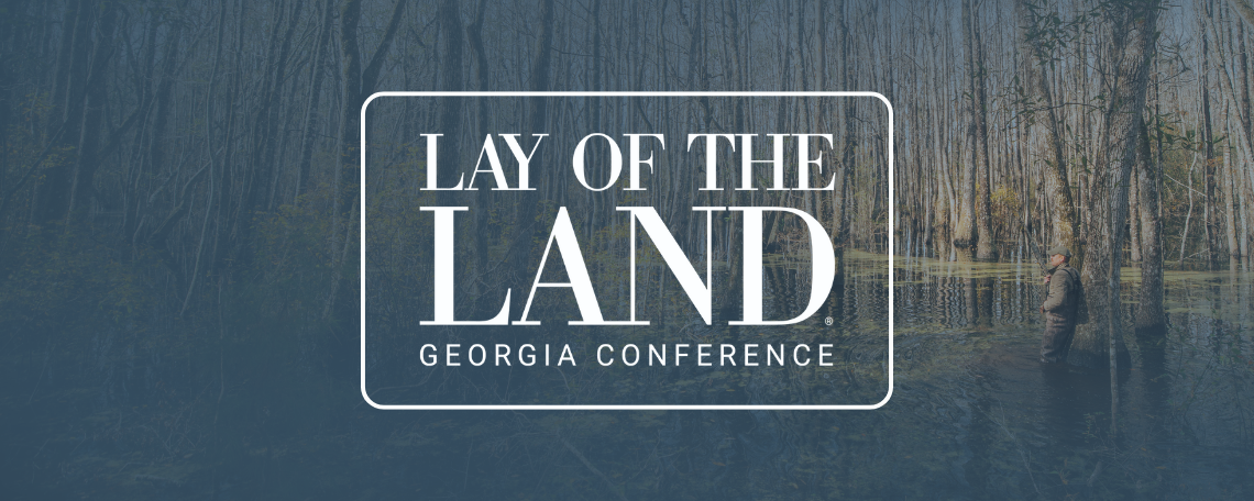 georgia land conference logo over some young pine stands